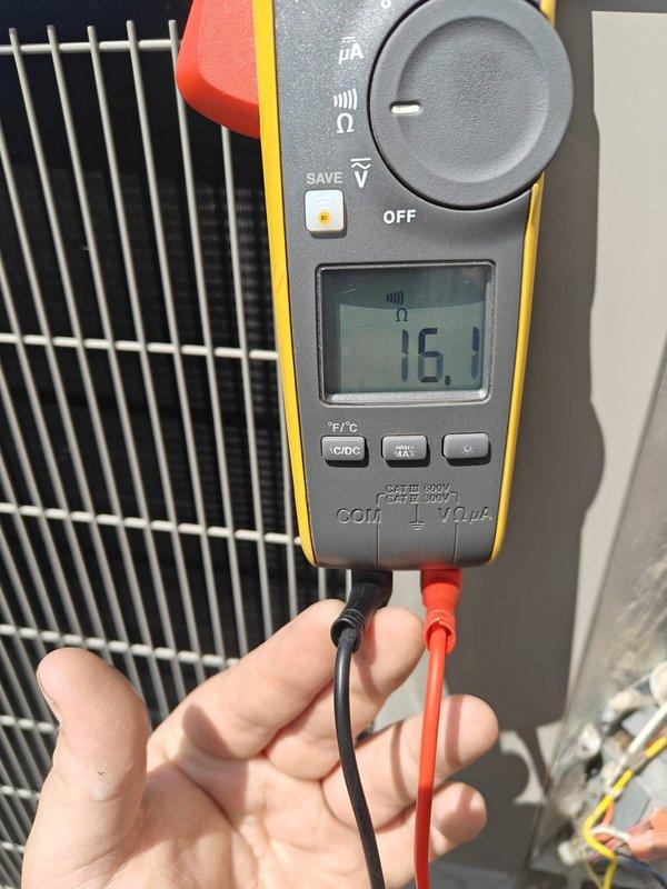 Responded to no cooling complaint and found tripped breaker affecting both air conditioning and water heating systems. Reset breaker at electrical panel and verified power restoration to HVAC unit, confirming 16.1-volt reading at equipment. System restored to normal operation with proper electrical supply confirmed.