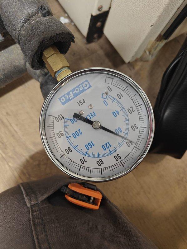 Completed 2026 cooling season maintenance on geothermal heat pump system. Inspected and verified system pressures using existing gauge, confirmed readings within normal operating parameters. Replaced air filter with new pleated media filter to maintain proper airflow and system efficiency for the upcoming cooling season.