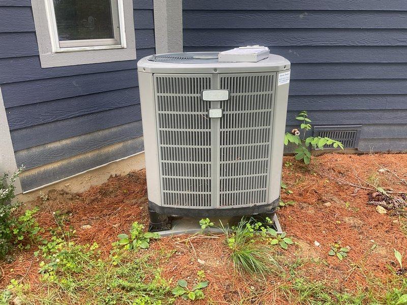Completed comprehensive estimate for full HVAC system replacement on residential property with 15+ year old equipment. Assessed existing furnace/air handler unit located in interior mechanical closet with standard gas line and electrical connections, and outdoor condensing unit positioned on base pad against exterior wall. System has reached end of serviceable life expectancy and requires complete replacement including indoor air handling equipment, outdoor condensing unit, refrigerant lines, electrical connections, and associated components to restore efficient heating and cooling operation.
