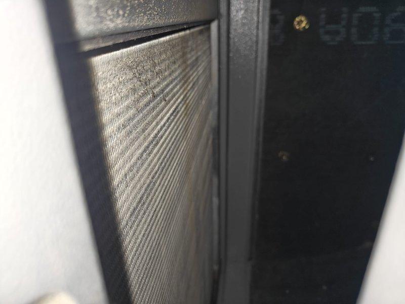 Completed cooling season maintenance on geothermal heat pump system. Inspected air filter showing moderate dust accumulation and documented condition. Measured and recorded system temperatures with supply line at 55.1°F and return line at 83.0°F, indicating proper refrigerant cycle operation and adequate temperature differential for cooling mode.