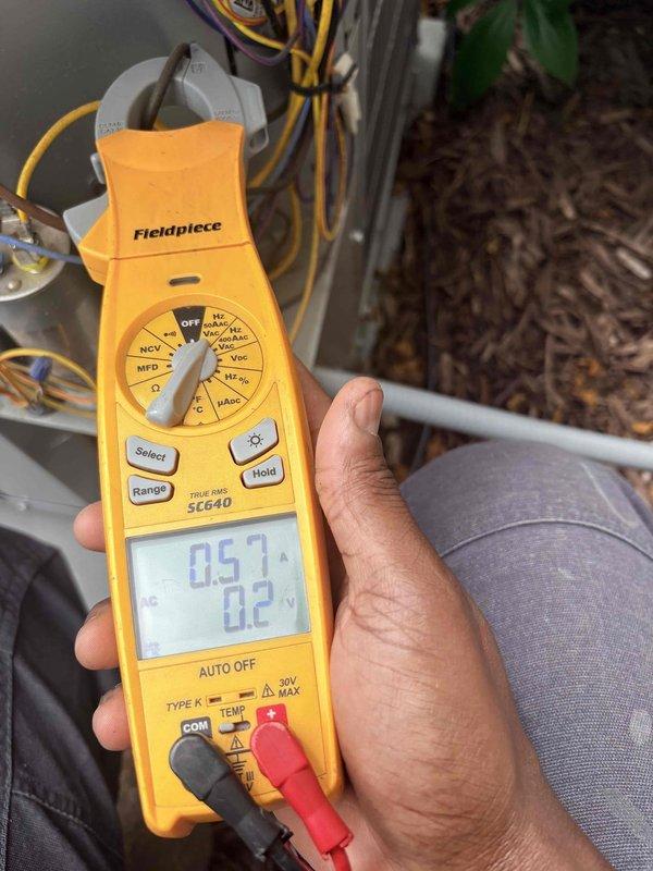 Completed routine cooling maintenance on residential HVAC system. Performed electrical diagnostics using digital multimeter, testing capacitor microfarad ratings and verifying proper voltage readings at outdoor condensing unit. All electrical components tested within manufacturer specifications, system operating normally with no issues found.