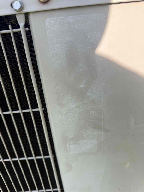 Responded to repeat service call for non-operational air conditioning system. Upon inspection, discovered significant condensate drainage issue with excessive rust-colored water accumulation in drip pan beneath air handler, indicating prolonged overflow condition and potential secondary drain line blockage. Cleared primary and secondary condensate drain lines, verified proper drainage flow, checked unit operation, and confirmed system cooling properly with no further drainage backup issues.