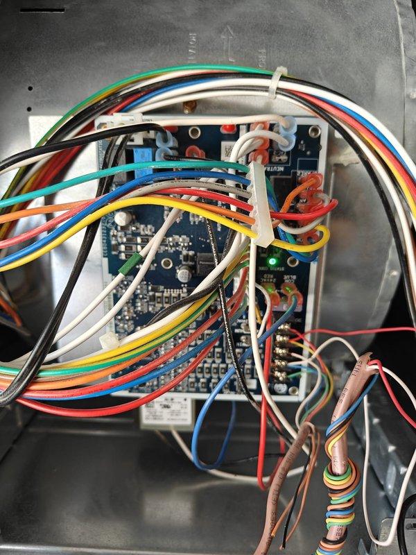 Completed 2026 cooling maintenance on two HVAC systems. Performed comprehensive inspection of both units including visual examination of control boards, wiring connections, and electrical components. Verified proper operation of circuit boards and terminal connections within control panels. Utilized Fluke clamp meter to measure and record amperage draw, confirming system operating at 3.99 amps DC within manufacturer specifications. Inspected condenser coils and heat exchanger components for cleanliness and proper airflow. Verified all wire connections secure with no signs of overheating or deterioration. Tested system controls and safety devices for proper operation. Both systems operating efficiently with all parameters within normal range.