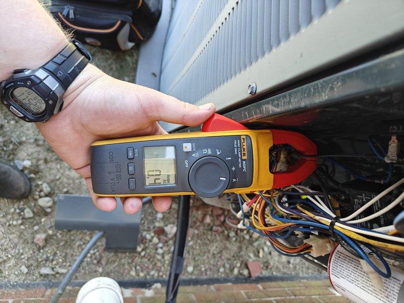 Completed scheduled cooling maintenance on residential air conditioning system. Performed comprehensive inspection of outdoor condensing unit including visual examination of control board and electrical connections, verified proper wire terminations and harness integrity, and measured operating amperage at 13 amps using clamp meter. All components inspected and found operating within normal parameters; system functioning properly with no deficiencies noted.