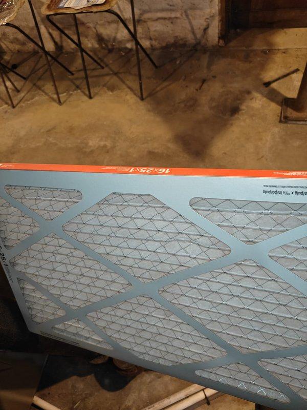 Completed scheduled cooling maintenance on residential HVAC system. Inspected and replaced 16x31 air filter, measured supply air temperature at 53.3°F indicating proper cooling operation, and documented heavy dust accumulation on equipment surfaces requiring attention during next service interval.