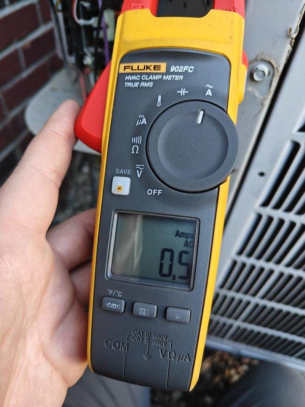 Completed comprehensive air conditioning maintenance and tune-up for new customer referral. Performed thorough cleaning of outdoor condenser unit with particular attention to removing cottonwood debris buildup, verified electrical connections and low-voltage control wiring, and conducted amperage draw testing using clamp meter which confirmed system operating within normal parameters at 0.9 amps AC.