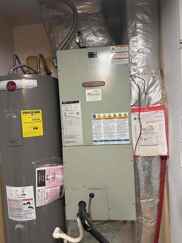 Completed comprehensive tune-up on residential heat pump system. Performed standard maintenance procedures including inspection of indoor air handler unit, refrigerant line set, pressure relief components, and filter drier assembly. All components found operating within normal parameters with proper labeling and code compliance verified.