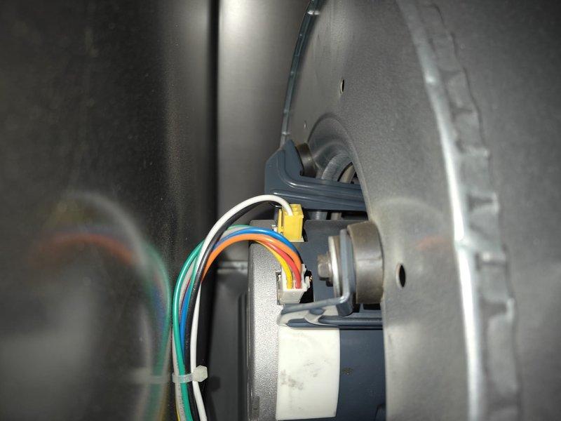 Completed comprehensive AC tune-up on residential air conditioning system. Inspected and verified proper operation of blower motor assembly with all electrical connections secure and wiring harness properly fastened. Tested dual-run capacitor rated at 45/5 µF, 440V AC, confirmed within acceptable tolerances and all terminal connections tight with no signs of deterioration or bulging.