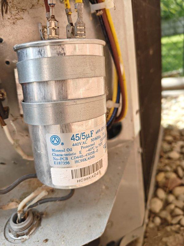 Completed comprehensive AC tune-up on residential air conditioning system. Inspected and verified proper operation of blower motor assembly with all electrical connections secure and wiring harness properly fastened. Tested dual-run capacitor rated at 45/5 µF, 440V AC, confirmed within acceptable tolerances and all terminal connections tight with no signs of deterioration or bulging.
