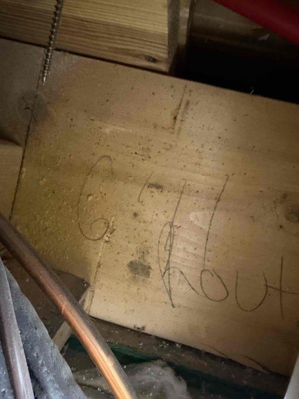 Responded to service call to investigate reported kink in refrigerant line set. Accessed mechanical area and attic space to inspect copper line routing and installation. Documented current conditions with photos showing line set path through utility closet and attic framing areas where spray foam insulation has been applied. Unable to locate specific kink during this visit. Return trip required with customer present to walk through and identify exact location of suspected restriction in line set.
