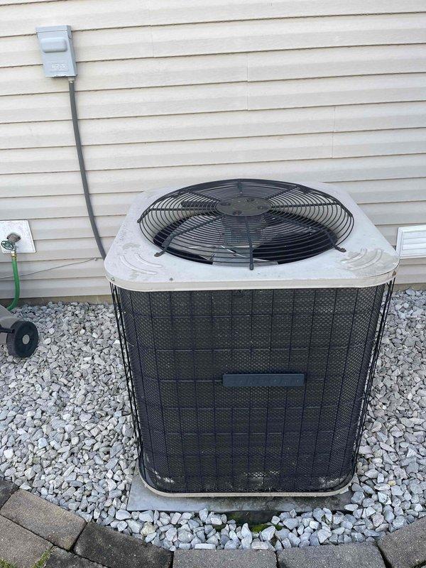 Provided comprehensive estimate for complete AC system replacement at residential property. Evaluated existing outdoor condenser unit with weathered components and indoor Lennox air handler, documenting current system configuration including electrical disconnects, refrigerant lines, and condensate drainage to prepare replacement specifications for both indoor and outdoor equipment.