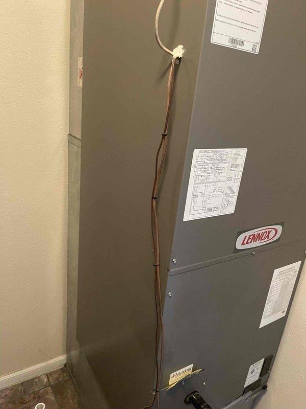 Provided comprehensive estimate for complete AC system replacement at residential property. Evaluated existing outdoor condenser unit with weathered components and indoor Lennox air handler, documenting current system configuration including electrical disconnects, refrigerant lines, and condensate drainage to prepare replacement specifications for both indoor and outdoor equipment.