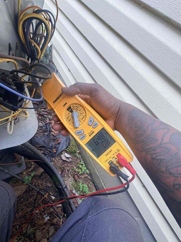Completed pre-sale inspection of Bryant furnace and air conditioning system as requested. Performed comprehensive system evaluation of heating equipment in basement, inspecting furnace unit, ductwork connections, PVC venting system, and condensate drainage. Verified proper installation and connections to water heater venting. Conducted exterior AC unit diagnostics using digital multimeter to test electrical components and capacitor functionality. Inspected condenser unit wiring, connections, and overall system operation. Addressed concern regarding damaged vent pipe connected to water heater. Both heating and cooling systems evaluated for proper operation prior to home sale.