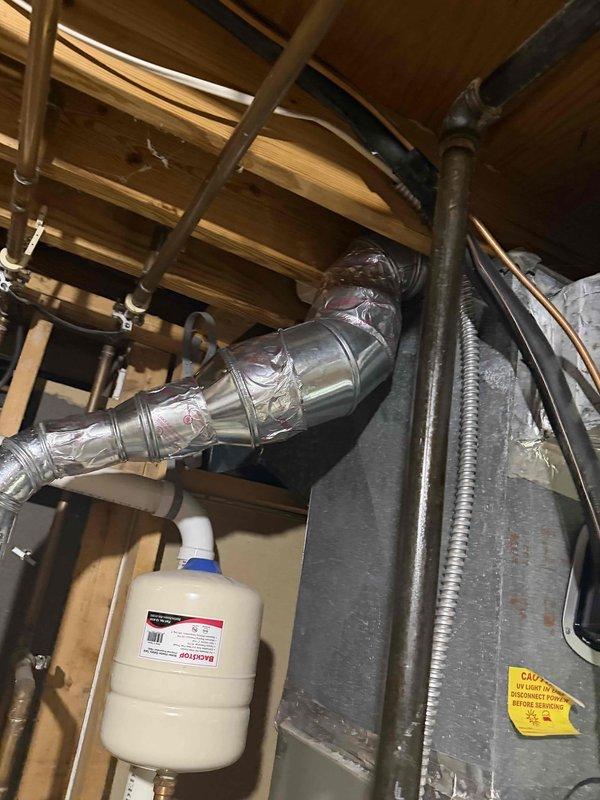 Completed quoted HVAC repair work in attic mechanical space. Installed new flexible ductwork with proper insulation wrapping and secured all connections with metal strapping per code requirements. System tested and verified operational upon completion.