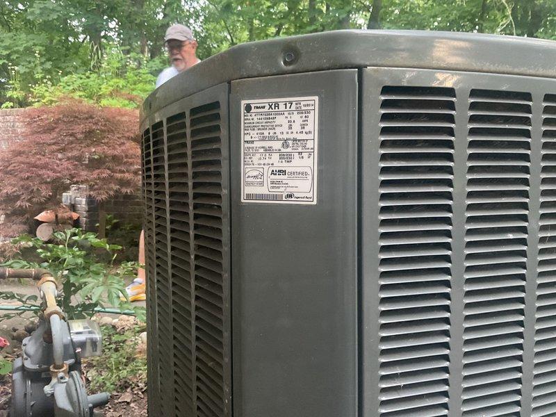 Provided comprehensive HVAC system replacement estimate for residential property experiencing inadequate cooling performance. Evaluated existing XR17 outdoor condensing unit and indoor furnace system with connected humidifier and assessed refrigerant lines, electrical connections, and ductwork configuration. Documented current equipment specifications and presented replacement options to address system's inability to maintain desired temperature setpoints.
