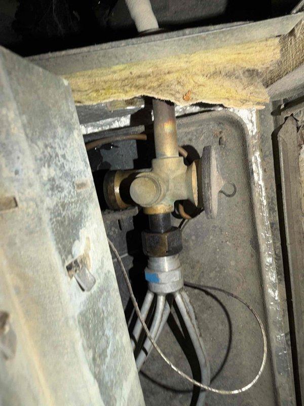 Responded to service call for non-operational unit and performed monthly AC maintenance. Upon arrival, conducted system inspection of air handler unit located in attic space. Accessed internal components through service panel to evaluate refrigerant lines, valve assembly, and connection points. Noted brass four-way valve connector with bundled refrigerant lines secured with proper clamps and insulation intact.

Per customer request and previous service notes, utilized portable power washer to thoroughly clean exterior condenser coil, removing accumulated dirt, debris, and organic material that can restrict airflow and reduce cooling efficiency. Verified all PVC drainage lines and condensate connections at air handler for proper flow and secure attachment. Inspected electrical connections, including conduit routing and power supply integrity.

Completed standard maintenance procedures including filter inspection, blower assembly evaluation, and verification of all manufacturer specifica