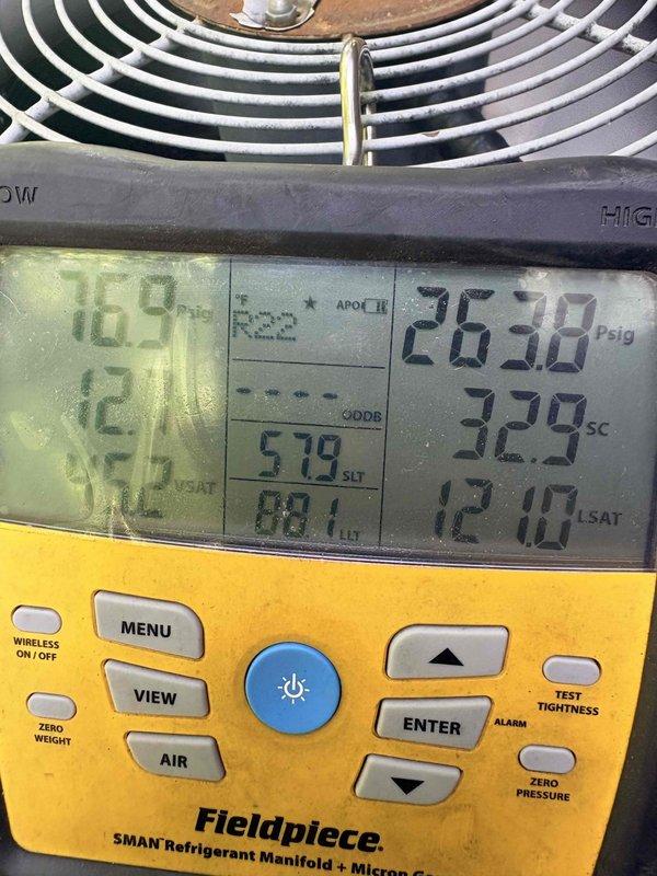 Responded to no cooling complaint on residential air conditioning system. Upon inspection, found evaporator coil frozen with ice buildup. Diagnosed contributing factors including severely restricted airflow due to excessive dust and debris accumulation on blower components and internal surfaces. Measured refrigerant pressures at condensing unit showing abnormal readings consistent with reduced airflow conditions. Identified heavily soiled capacitor and surrounding components indicating extended period without maintenance. Recommended system cleaning, filter replacement, and follow-up evaluation after thaw to determine if additional refrigerant circuit issues exist.