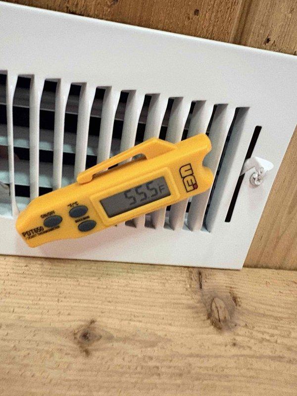 Responded to no cooling complaint on two HVAC units located in barn structure, both installed by previous contractor and approximately one year old. Performed diagnostic evaluation on both non-operational systems, measuring supply air temperature at floor registers which indicated lack of cooling output. Advised property owner of potential labor warranty coverage through original installing contractor and confirmed equipment remains under manufacturer's parts warranty due to recent installation date.