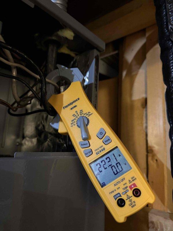 Responded to warranty call for burning plastic odor upon unit operation on system installed 2 months prior. Performed diagnostic inspection of furnace/air handler assembly. Utilized digital multimeter to verify electrical readings and confirm proper voltage supply to unit. Inspected cabinet seals and weather stripping at panel interfaces for proper installation and fit. Examined internal components and wiring connections for signs of overheating or manufacturing defects. Verified foam gasket material properly seated between cabinet sections to prevent air bypass. No electrical anomalies detected during testing. Unit operating within normal parameters at time of inspection.