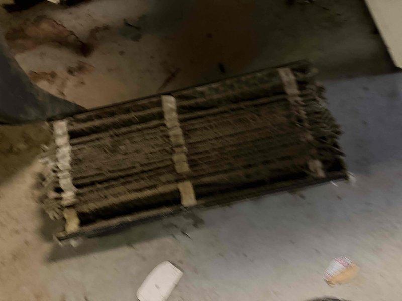 Responded to service call for newly installed unit experiencing freeze-up and inadequate temperature control. Instructed occupant to power down system and operate fan only to prevent further ice accumulation on evaporator coil. Upon inspection, documented crawlspace installation conditions showing evidence of significant moisture infiltration and water staining on structural members surrounding ductwork, which may contribute to ongoing humidity issues affecting system performance. Photographed evaporator coil assembly displaying dust accumulation on fins and insulation placement in mechanical space. Recommended allowing adequate thaw time before conducting diagnostic assessment of refrigerant charge, airflow restrictions, and potential drainage issues to determine root cause of freeze condition.