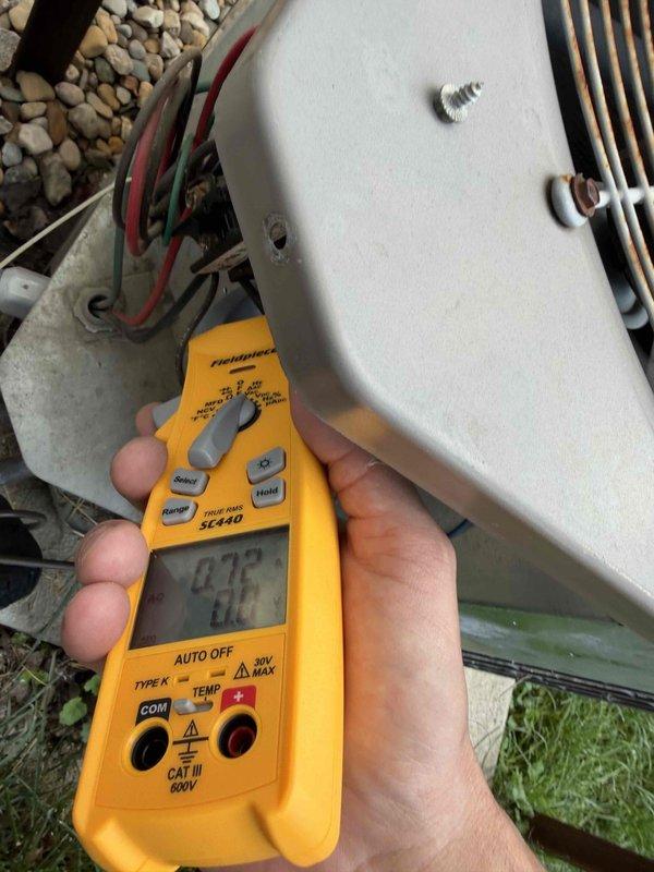 Performed comprehensive cooling maintenance on outdoor condensing unit. Conducted electrical diagnostics using digital multimeter to verify proper voltage and amperage readings at the unit's control panel and junction box. Inspected condenser fan assembly, noting visible rust and weathering on protective grille consistent with normal outdoor exposure. Verified fan motor operation and assessed overall system condition. All electrical measurements were within acceptable parameters for continued operation.