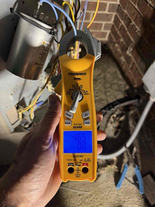 Responded to no cooling complaint with thermostat reading 78°F. Upon arrival, performed diagnostic testing of the HVAC system using digital multimeter to measure electrical values at the outdoor unit. Checked compressor amperage, capacitor functionality, and verified proper voltage supply to all major components. System components including capacitor and electrical connections were inspected and tested to identify the root cause of the cooling failure.
