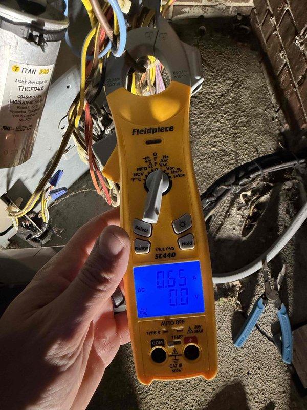 Responded to no cooling complaint with thermostat reading 78°F. Upon arrival, performed diagnostic testing of the HVAC system using digital multimeter to measure electrical values at the outdoor unit. Checked compressor amperage, capacitor functionality, and verified proper voltage supply to all major components. System components including capacitor and electrical connections were inspected and tested to identify the root cause of the cooling failure.
