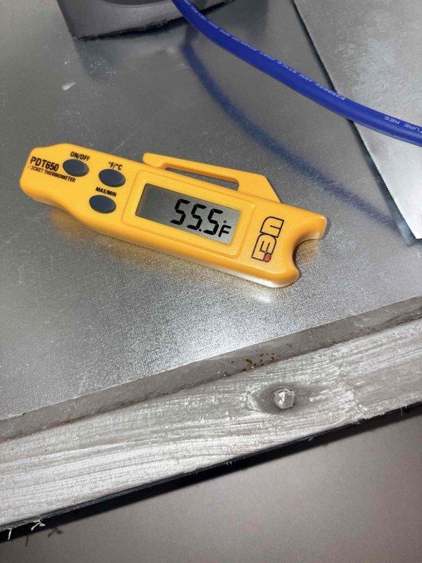 Responded to no cooling complaint on heat pump system. Diagnosed failed defrost control board preventing proper defrost cycle operation. Replaced defective defrost board with OEM replacement part, verified proper mounting and electrical connections. Tested system operation and confirmed unit cycling correctly with temperature reading of 55.5°F at condenser, restoring normal cooling function.