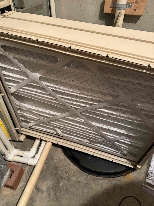 Completed comprehensive cooling maintenance on residential HVAC system. Performed visual inspection of air handler unit, blower motor assembly, and evaporator coil components in attic installation. Verified proper operation of blower motor, checked electrical connections and wiring for secure termination, and inspected refrigerant lines for adequate insulation and signs of leakage. Examined air filter condition and confirmed proper fitment in filter rack. Inspected condensate drain system including PVC drain lines for proper flow and potential blockages. All components found operating within normal parameters with no immediate service needs identified. System ready for continued operation through cooling season.