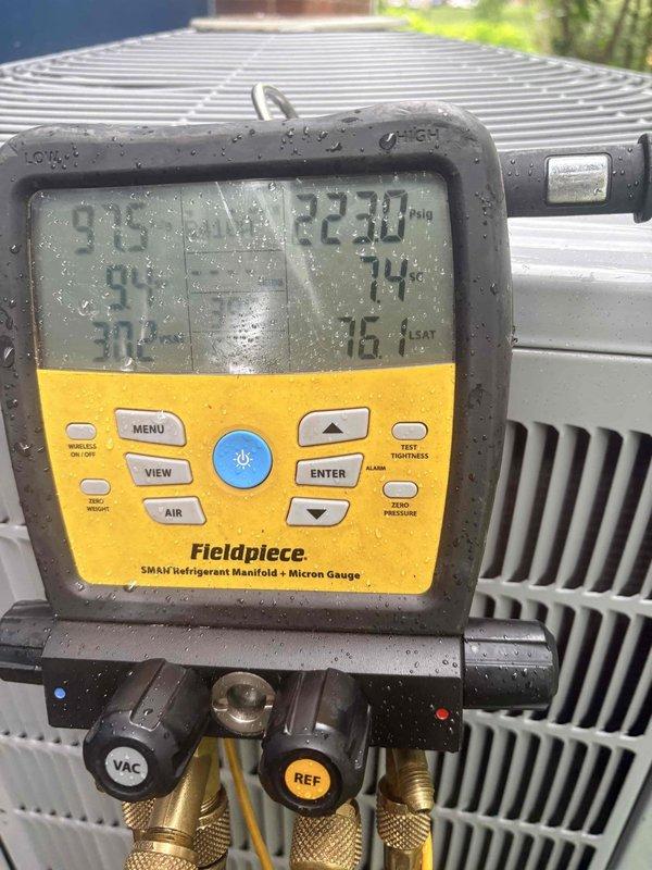Performed scheduled cooling maintenance on residential air conditioning system. Upon arrival, investigated reported intermittent issue where unit requires power cycling to resume operation, with water accumulation noted near equipment during shutdowns. Connected refrigerant manifold gauges and recorded system pressures and temperatures to evaluate operational performance. Inspected outdoor condenser unit including coil condition, fan operation, and cabinet integrity. Verified refrigerant charge levels and system parameters during run cycle. System was operating normally at time of maintenance with no active faults present. Documented current operating conditions and equipment status for ongoing monitoring of intermittent concern.