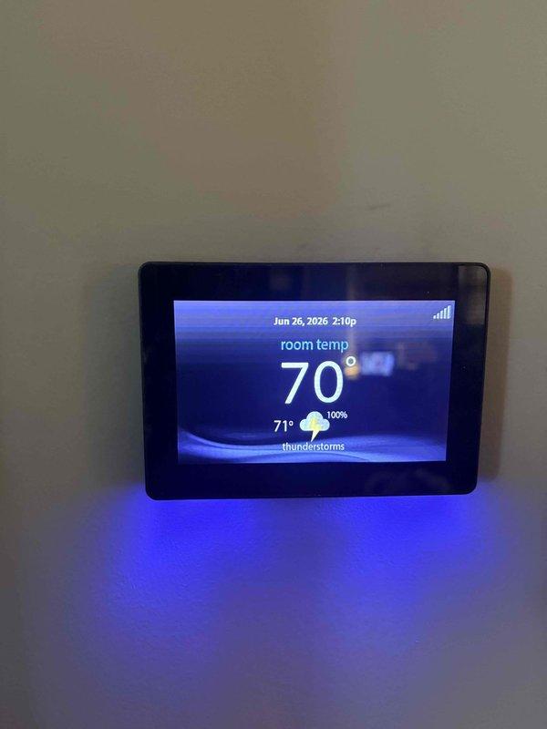 Completed first cooling maintenance service on residential HVAC system. Performed comprehensive inspection of furnace unit and AprilAire air filtration system, verified thermostat operation showing proper temperature control at 70°F, and inspected all PVC condensate drainage lines and connections for proper operation.