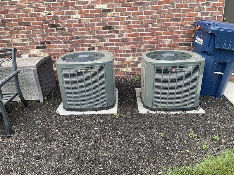 Conducted comprehensive site evaluation of existing dual-zone HVAC system for replacement estimate. Assessed two outdoor condenser units positioned on concrete pads and indoor air handling equipment including furnace and ductwork in basement mechanical room. Documented current system configuration, equipment condition, and installation requirements to provide complete replacement options for both operating systems.