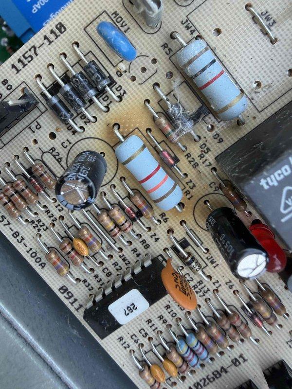 Completed comprehensive cooling system maintenance inspection and service. Documented control board condition showing age-related discoloration and verified all electronic components including resistors, capacitors, and circuit connections were functioning within specifications. Replaced heavily soiled air filter with visible dust and debris accumulation to restore proper airflow and system efficiency.