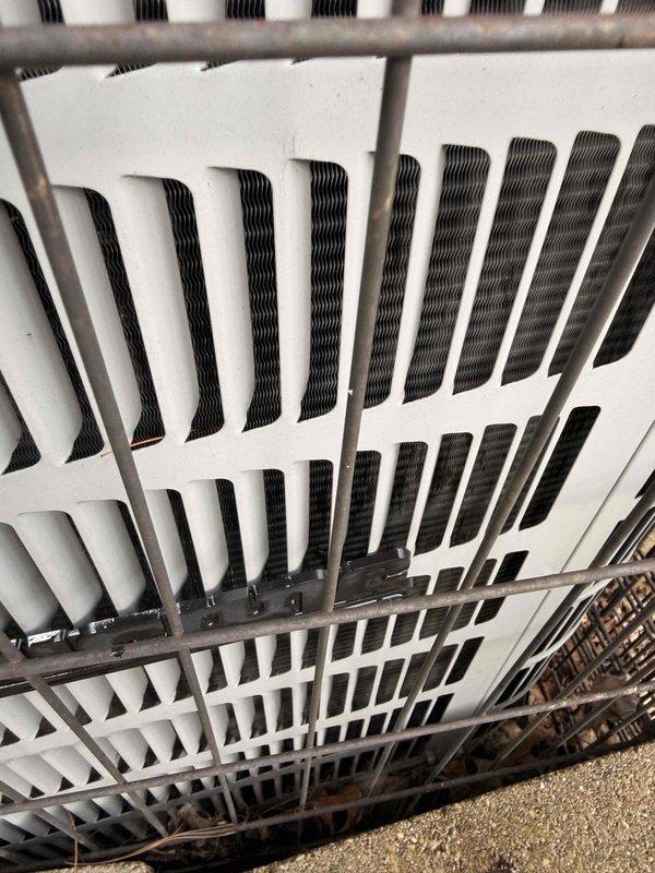 Completed annual cooling maintenance on residential HVAC system located in basement. Performed comprehensive inspection of heat exchanger and condenser unit, verified proper airflow through parallel fin assembly, and inspected air filtration system with diamond-pattern mesh filter. All components found operating within normal parameters, system ready for cooling season.