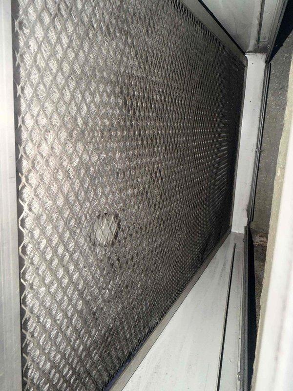 Completed annual cooling maintenance on residential HVAC system located in basement. Performed comprehensive inspection of heat exchanger and condenser unit, verified proper airflow through parallel fin assembly, and inspected air filtration system with diamond-pattern mesh filter. All components found operating within normal parameters, system ready for cooling season.