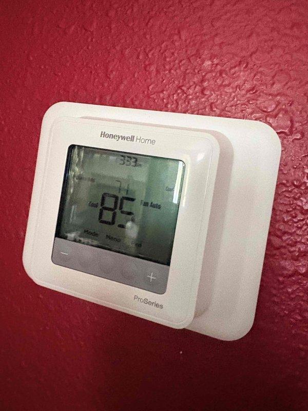 Installed Honeywell Home ProSeries T6 digital thermostat to replace existing Nest unit. Verified proper wiring connections at terminal block including Y1, Y2, G, OB, Rc, W1, and W2 terminals. Tested system operation to confirm HVAC unit now cycles on properly and thermostat communicates correctly with equipment.