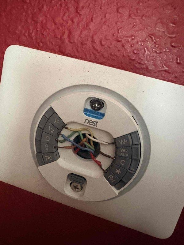 Installed Honeywell Home ProSeries T6 digital thermostat to replace existing Nest unit. Verified proper wiring connections at terminal block including Y1, Y2, G, OB, Rc, W1, and W2 terminals. Tested system operation to confirm HVAC unit now cycles on properly and thermostat communicates correctly with equipment.