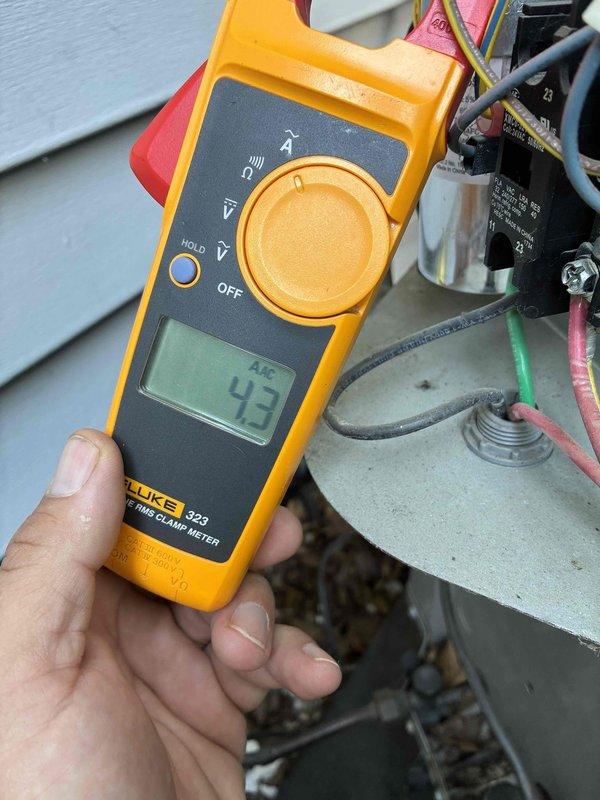 Performed comprehensive heating system maintenance on residential HVAC unit. Conducted electrical diagnostics using clamp meter to verify proper amperage draw on system components, recording readings of 4.3 AAC and 0.6 AAC at various test points. Inspected capacitor connections and contactor assembly, verifying all wire terminations were secure and properly seated. Tested electrical components including relay operation and control circuit functionality. All measurements fell within manufacturer specifications, confirming system is operating efficiently and ready for heating season. Membership renewal was processed on-site as requested, with scheduling accommodations made per household requirements.