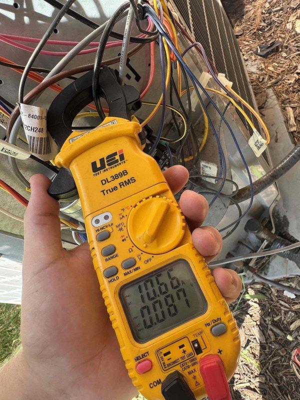 Performed comprehensive AC tune-up on outdoor condensing unit, including electrical diagnostics using digital clamp meter to verify proper amperage draw and voltage readings on compressor and condenser fan motor. All electrical connections were inspected, system operating parameters measured and confirmed within manufacturer specifications, and unit found to be functioning properly with no issues detected.