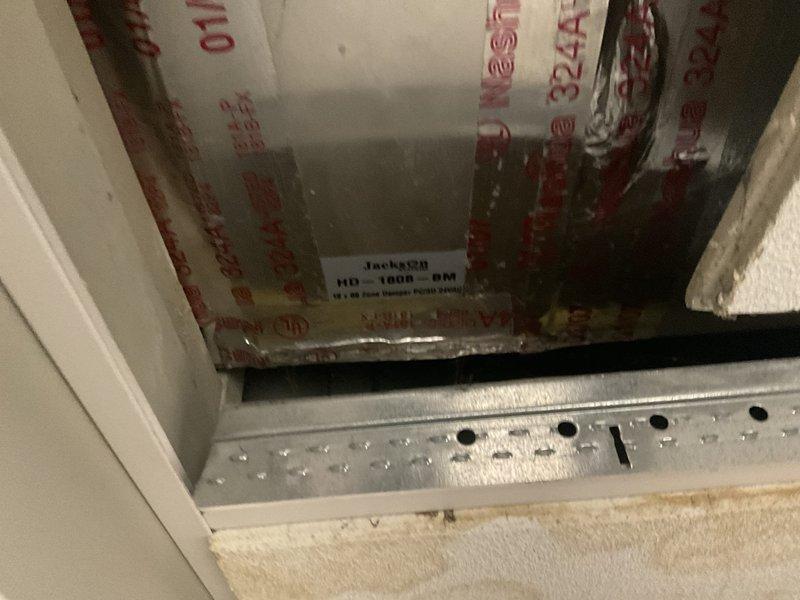 Completed on-site assessment for full HVAC system replacement at residential property. Evaluated existing air handler unit installed in interior utility space and inspected accessible ductwork components through ceiling access point. Documented current equipment configuration including Jackson HD-180R-BR unit positioning, ductwork connections, and mechanical room layout to provide comprehensive replacement estimate and system specifications.