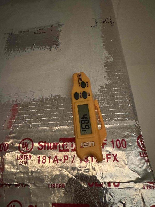 Completed monthly cooling maintenance on residential HVAC system. Performed temperature measurements at supply plenum, recording 83°F readings using digital thermometer. Conducted electrical diagnostics with multimeter to verify system amperage and voltage levels at equipment. Inspected foil-faced ductwork insulation for integrity and proper sealing. All measurements within normal operating parameters and system operating as designed.