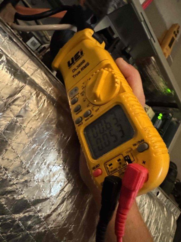 Completed monthly cooling maintenance on residential HVAC system. Performed temperature measurements at supply plenum, recording 83°F readings using digital thermometer. Conducted electrical diagnostics with multimeter to verify system amperage and voltage levels at equipment. Inspected foil-faced ductwork insulation for integrity and proper sealing. All measurements within normal operating parameters and system operating as designed.