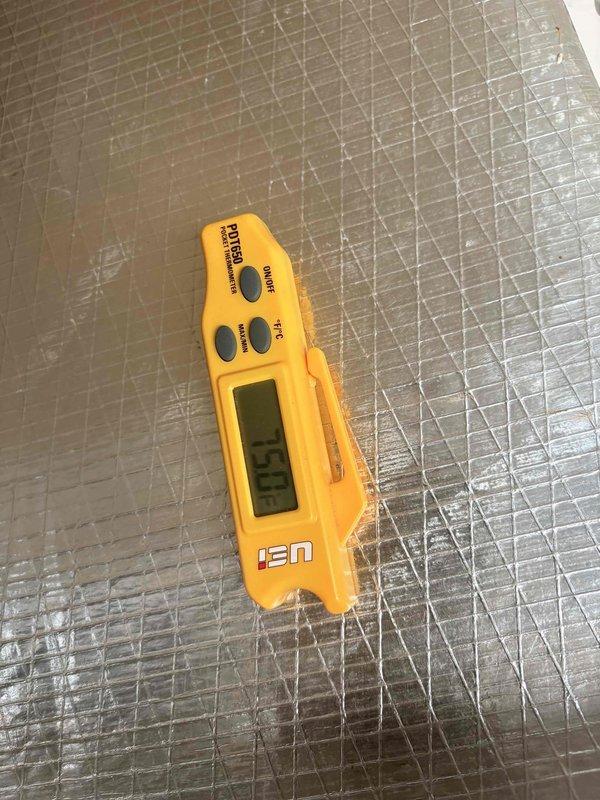 Completed preventive maintenance and tune-up on a 1-year-old ground-level cooling system located in garage. Inspected and documented system temperatures using pipe clamp thermometer, evaluated refrigerant levels and operational parameters, and replaced dirty air filter with accumulated dust and debris. All system components operating within normal specifications upon completion of scheduled maintenance service.