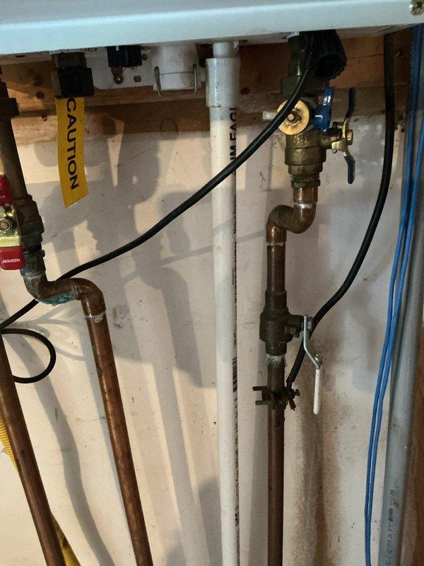 Performed scheduled tankless water heater flush service to remove mineral buildup and maintain optimal unit performance. Isolated water heater using shut-off valves, circulated descaling solution through the system, and verified proper operation of all connections and components upon completion.