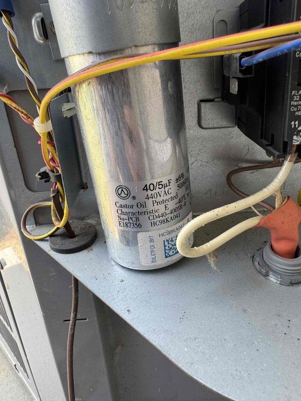 Completed scheduled preventative maintenance on residential cooling system. Performed comprehensive electrical diagnostics using digital clamp meter, recording amperage draw of 5.94 amps and voltage reading of 170 volts at outdoor condensing unit. Inspected dual-run capacitor rated at 40/5 microfarad, 440V AC with castor oil fill, confirmed proper electrical connections and wire terminations throughout control circuit. All electrical components operating within manufacturer specifications, system tested and left in proper working condition.