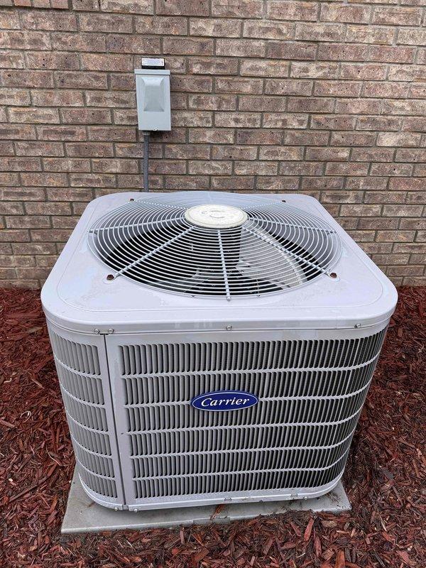 Completed scheduled preventative maintenance cooling tune-up on Carrier outdoor condensing unit. Upon inspection, found significant accumulation of dirt, dust, and debris restricting airflow through condenser coil fins. Performed thorough cleaning of condenser coil to restore proper airflow and heat transfer efficiency, removing caked-on contamination from between fins. Unit operational and running within normal parameters upon completion.
