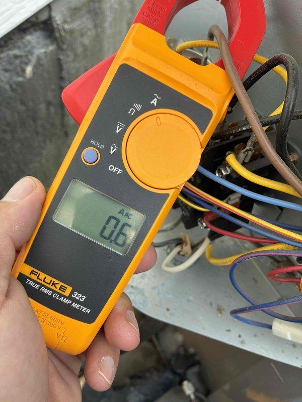 Completed scheduled cooling maintenance on HVAC system. Performed comprehensive electrical diagnostics using calibrated test equipment, measuring system voltage at 328.8V AC and verifying compressor amperage draw at 0.6A AC. All electrical readings fall within manufacturer specifications, indicating proper system operation and component health. Unit operating efficiently with no deficiencies noted.