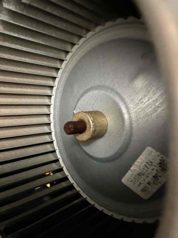 Completed scheduled cooling maintenance on HVAC system. Inspected evaporator coil and blower motor assembly, documenting existing dust and particulate accumulation on coil fins and ventilation louvers. All components found structurally intact and operational, with system functioning within normal parameters.