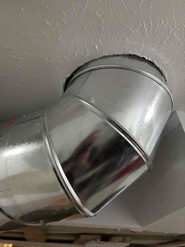 Performed comprehensive second opinion evaluation of recently installed ductwork system to verify proper sizing and compatibility with newly installed HVAC unit. Inspected exposed metallic ductwork runs throughout interior spaces, including main trunk lines and transitions, documenting installation quality, sealing at ceiling penetrations, and overall system design. Assessed duct sizing calculations against equipment specifications to confirm adequate airflow capacity and proper system performance.