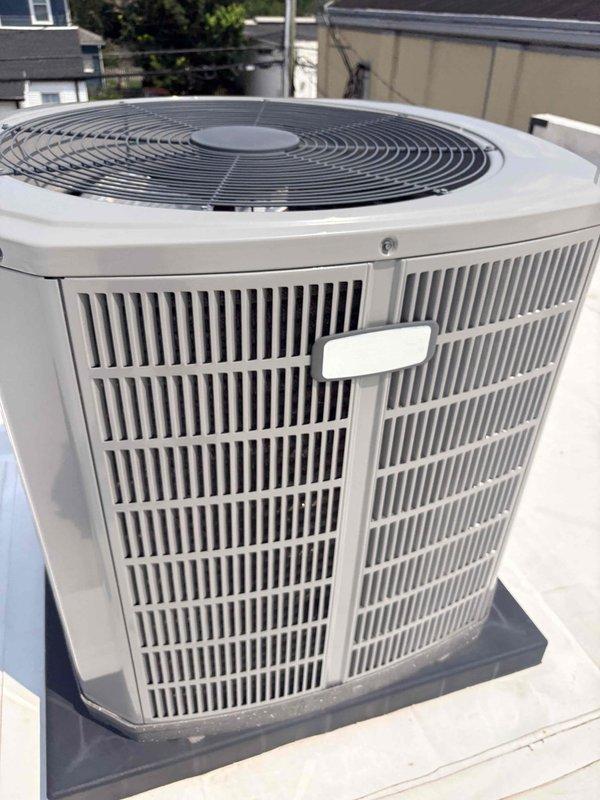 Completed commercial cooling system tune-up and preventative maintenance on rooftop-mounted air conditioning unit. Performed electrical diagnostics using digital multimeter to verify proper voltage and amperage readings at system components, inspected condenser unit exterior condition, checked fan operation and guard assembly, and evaluated overall system performance. Unit found to be operating within normal parameters with no immediate repairs required.